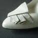 white 80s pumps with snakeskin pleat detail sz 5.5