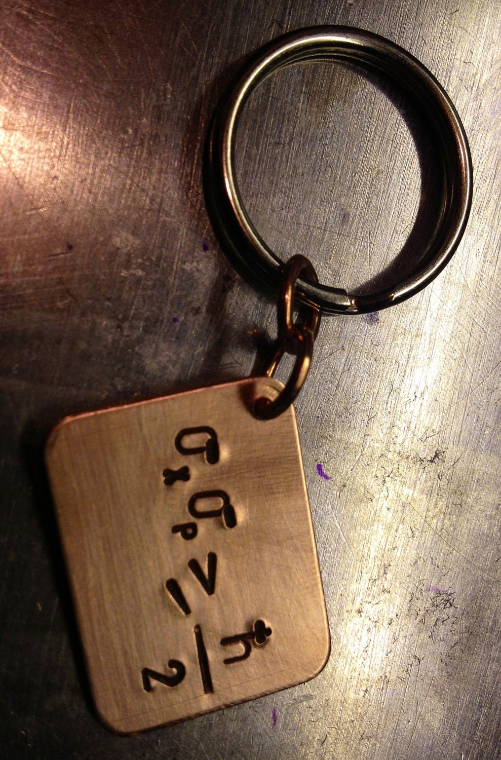 Heisenberg Uncertainty Principle Keychain in Copper and Steel