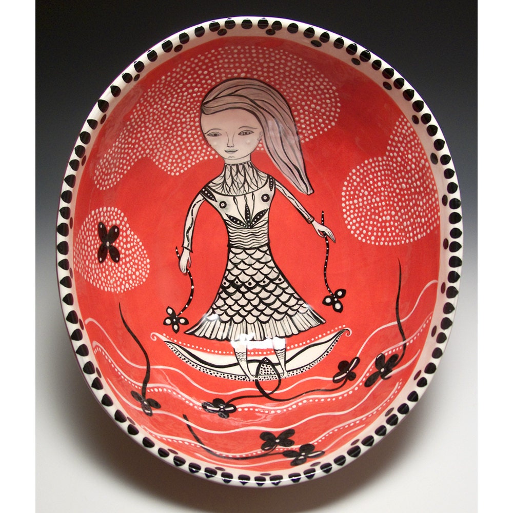 A Large Red Ceramic Bowl