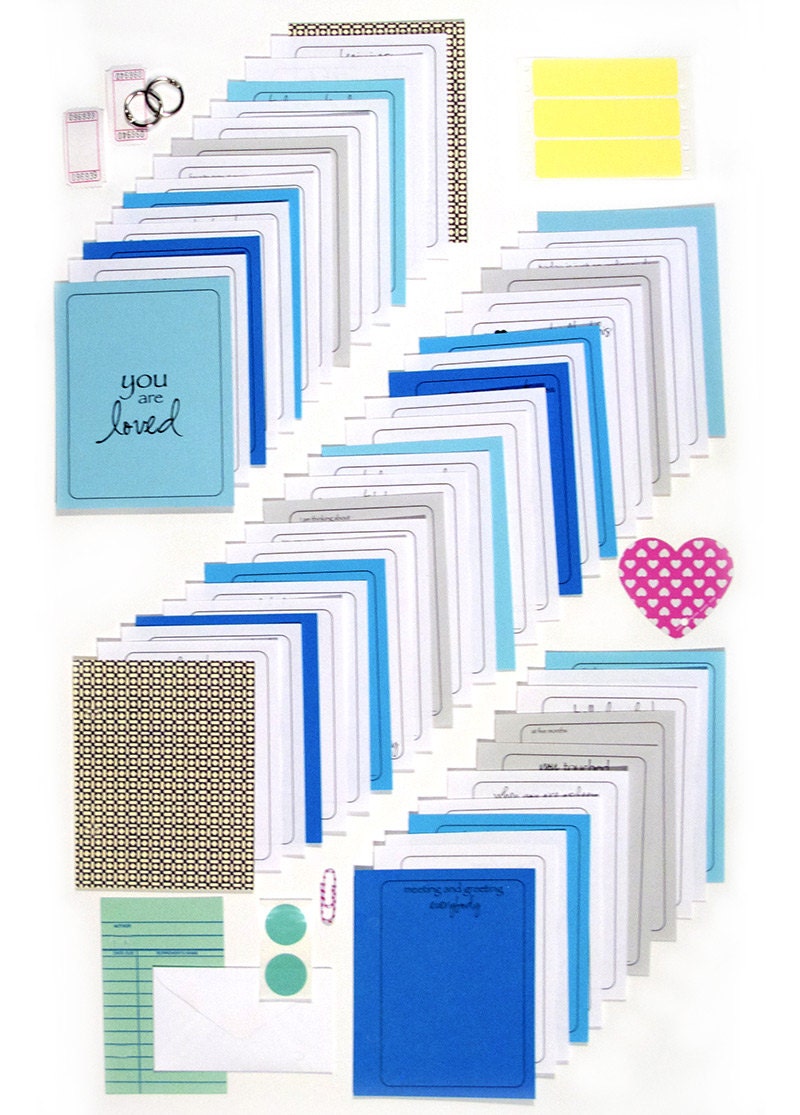 Baby Album or Baby Book for a Newborn or Adopted Baby- Writing Prompts for Celebrating Milestones in Pale Blue Linen