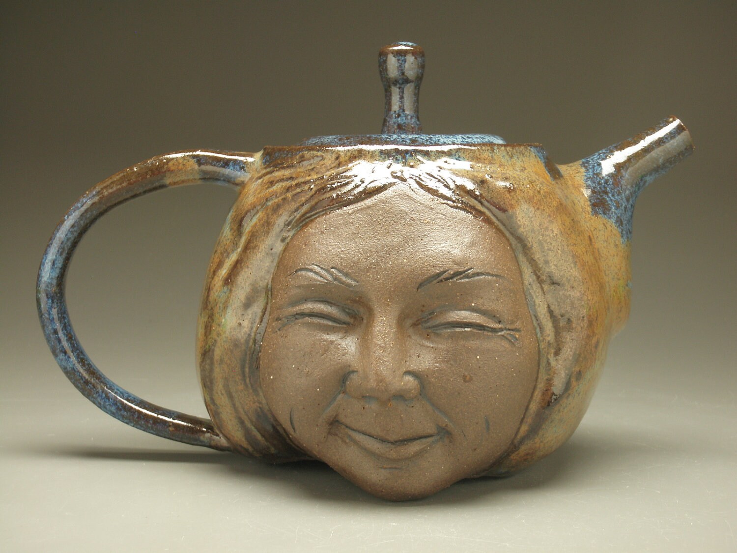 ceramic face sculpture