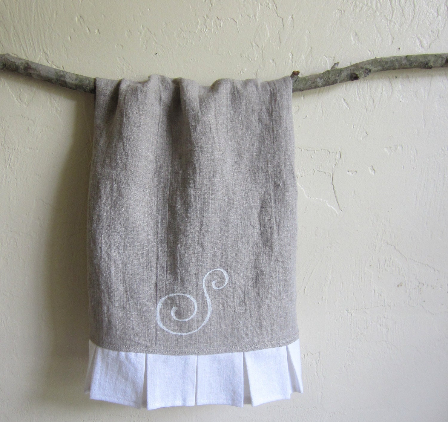 Monogrammed linen guest towel with white ruffle