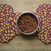 Red, Yellow Braided Dogbone Mat from recycled cotton