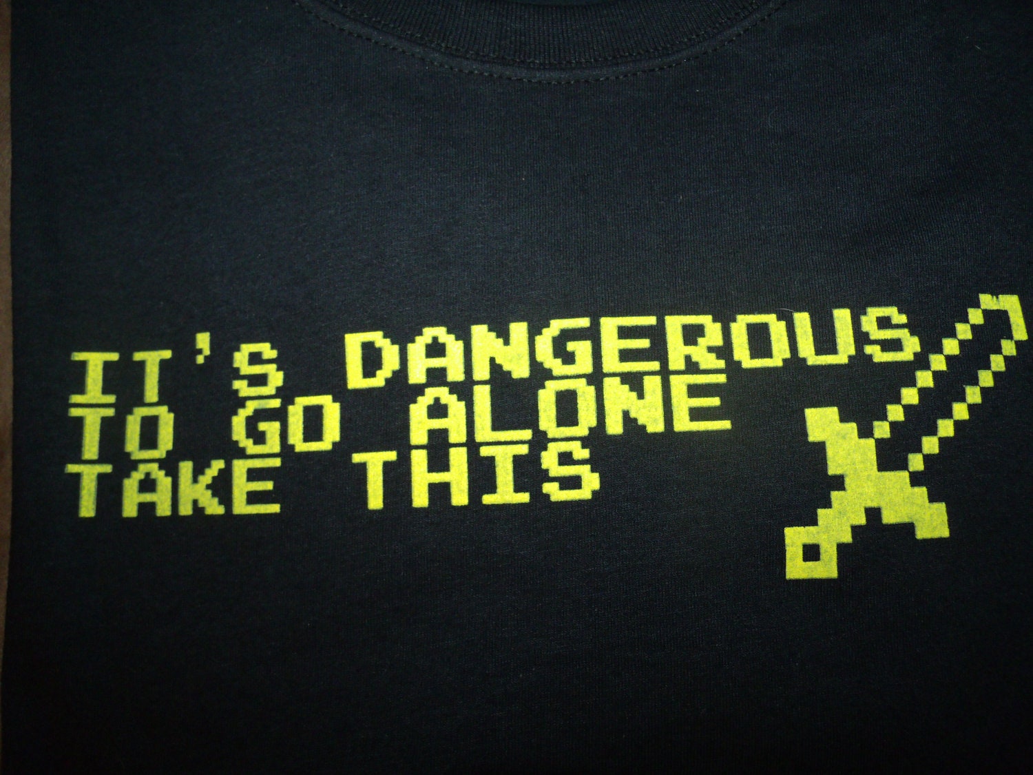 It's Dangerous to go alone take this 8 bit sword Adult sizes