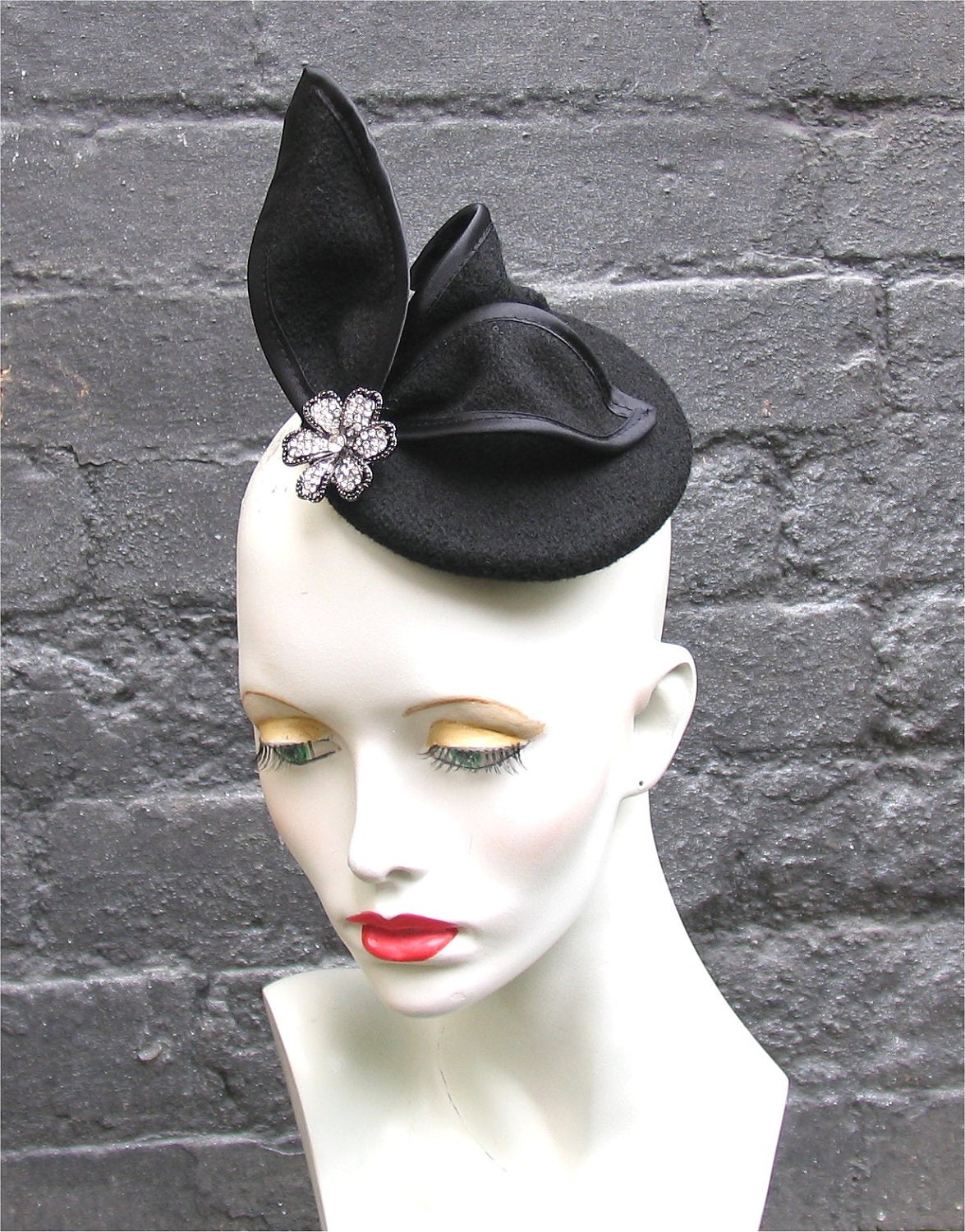 Black cocktail fascinator hat with diamonte flower