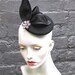 Black cocktail fascinator hat with diamonte flower