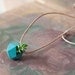 Miniature Icosahedron in Teal: A Wearable Planter