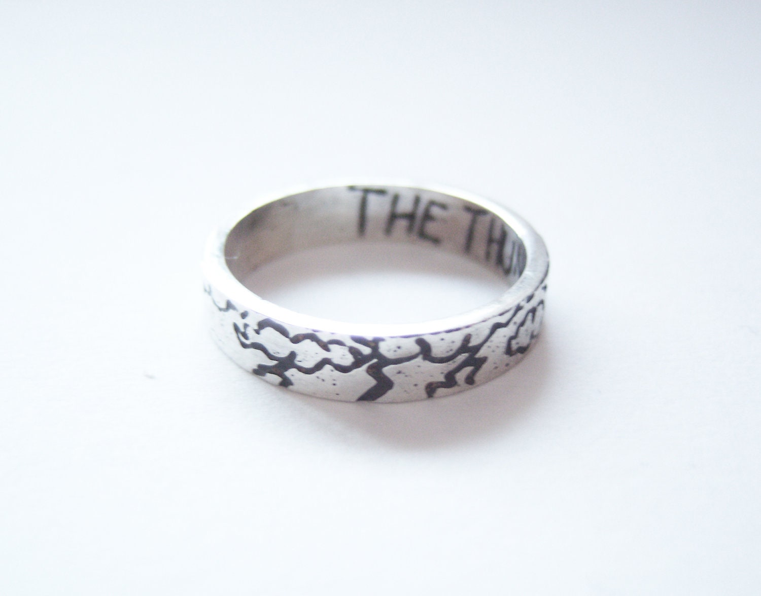 Avengers Thor inspired etched silver ring with thunderclouds and the inside reading 'THE THUNDERER'