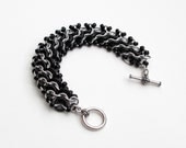 Black chainmail bracelet with glass rings