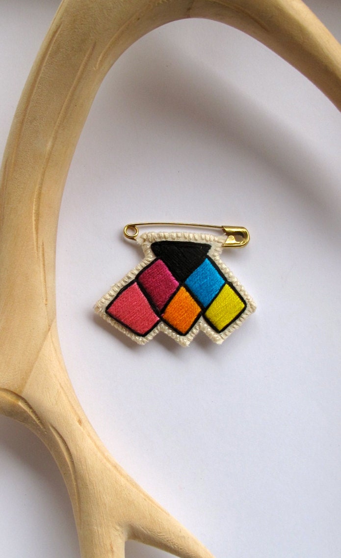 Rainbow chevron badge embroidered small on a gold pin