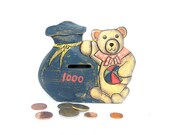 Vintage money box shabby chic blue wooden bear with a colorful ball