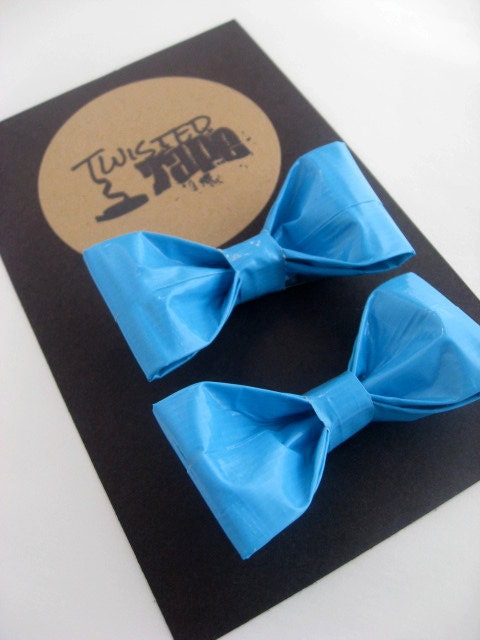 set of 2, 2 inch, duct tape hair bows. Backed with an alligator clip. Your choice color/pattern