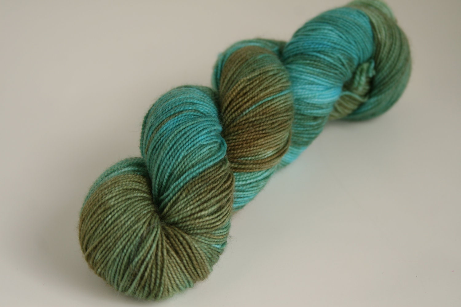 Handpainted 80/20 Supewash BFL/Nylon Sock Yarn "Raw Turquoise" -- Jasper Fingering