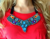 Evelyn necklace - made of blue zircon crystals, focal cabochons, handmade friendship bracelets, satin ribbons and suede backing.