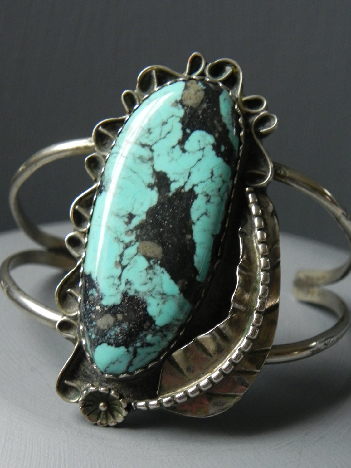 Sizable Vintage Native American Turquoise and Sculpted & Stamped Silver Cuff Bracelet
