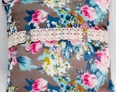 Floral cushion with vintage trims