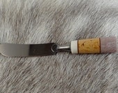 Butter knife with a handmade reindeer antler and curley birch handle. presented in a gift box.