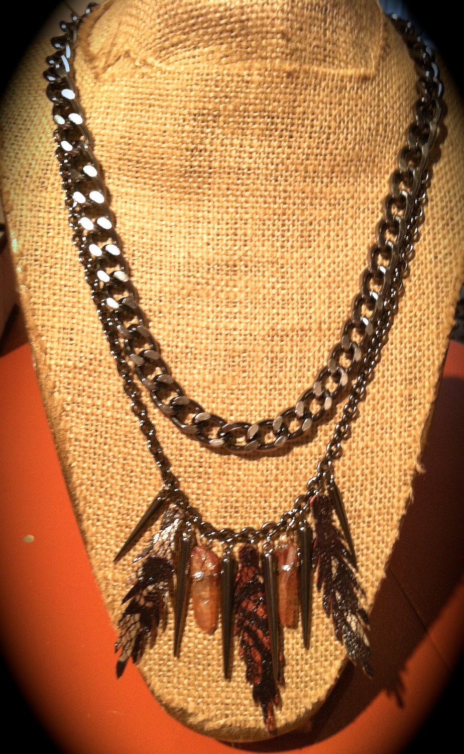 Orange and brown lace leather feather and gunmetal 2 chain necklace