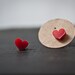 red heart stud earrings.