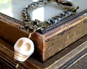 White Skull and Antique Bronze Charm Bracelet