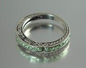 CARYATID wedding band in sterling silver with Tsavorites