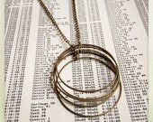 brass circle tangle necklace