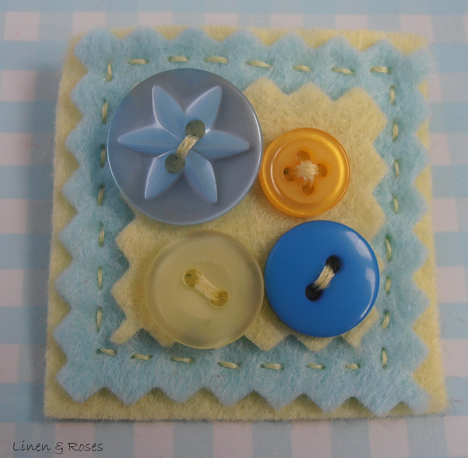 Lemon and pale blue square felt brooch with button detail