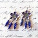 Princess Luna Earrings - Steampunk Flower Earrings in Purple with Watch Gears and Vintage Blue Jewels