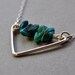 Oceanids Necklace. Short Version. Rough turquoise howlite gemstones on a sterling silver chevron and chain.