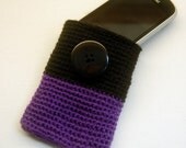 Cell phone cozy.  Black and purple