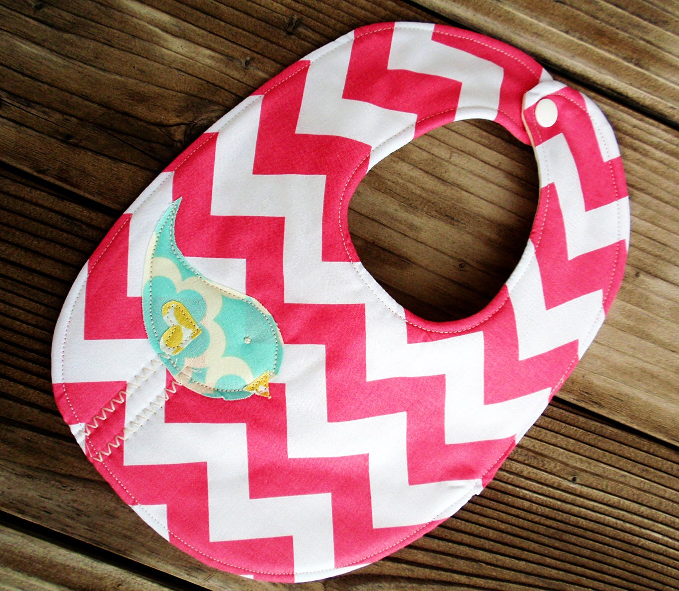 Pink chevron baby bib with aqua birdie