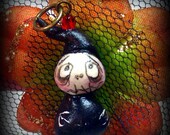 OOAK Tiny Grimmy Reaper clay pendant
