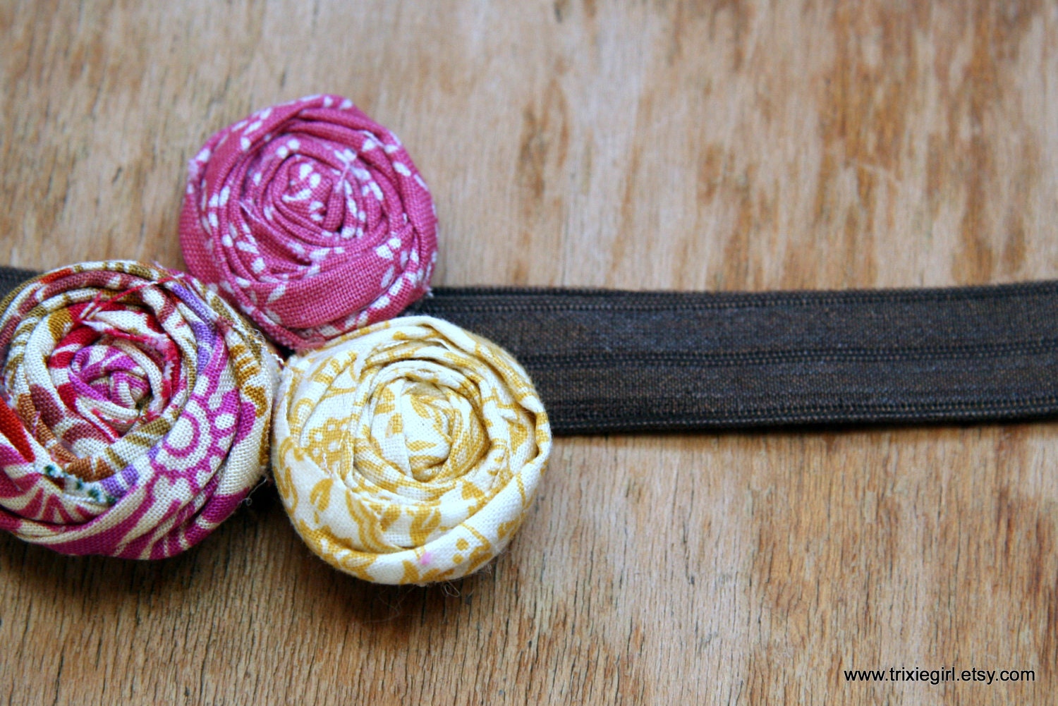 Fabric flower headband in golden goddess paisley and pink flowers