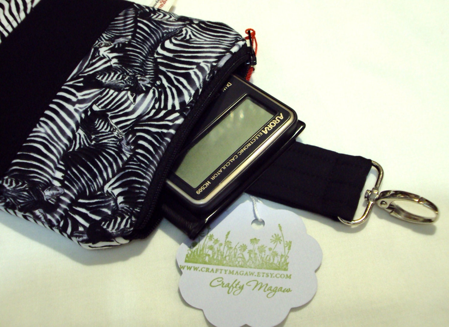 Zebra padded zipper bag with swivel snap  Good for cell phone, I pod, or money