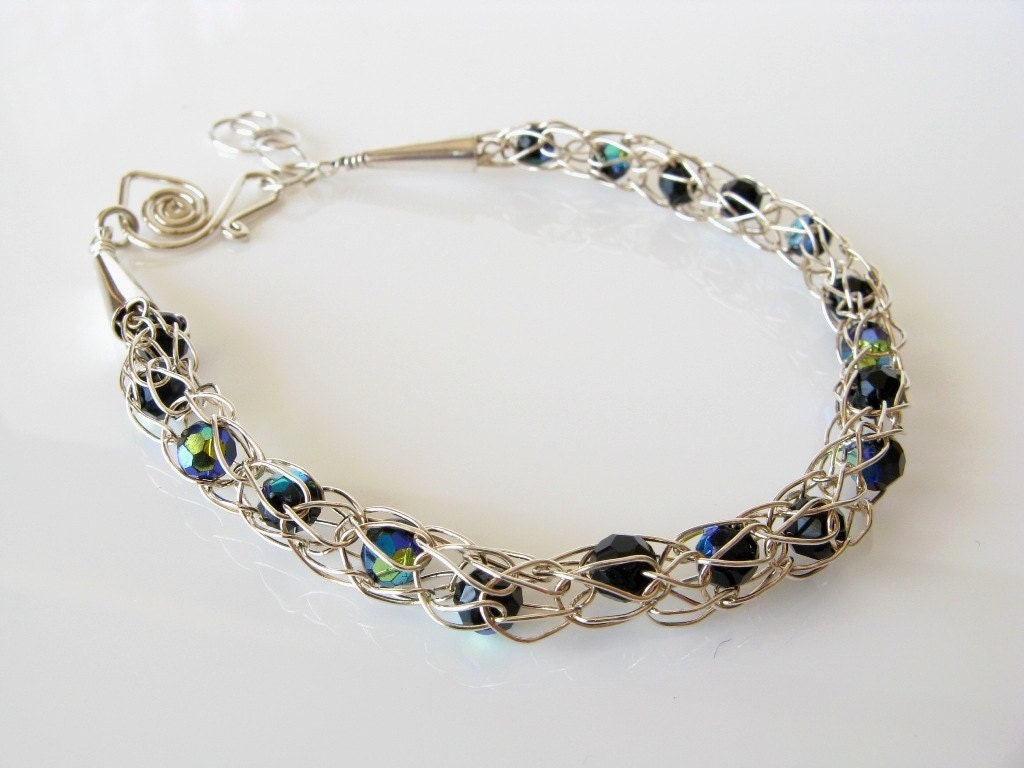 Silver wire crochet bracelet with blue black crystals