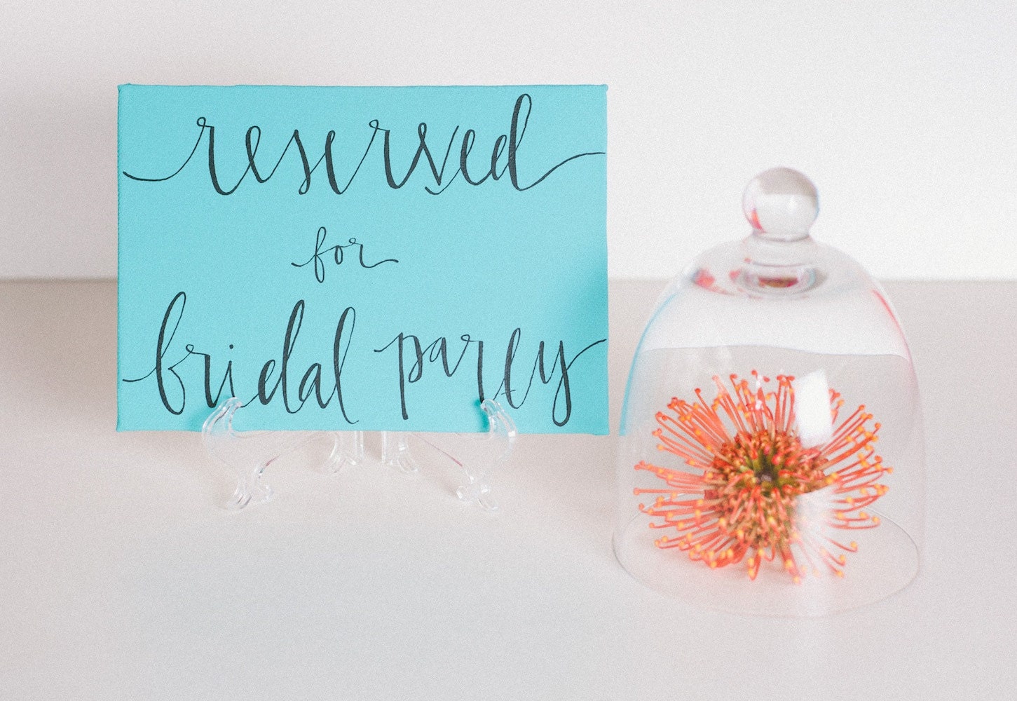 teal calligraphy reserved sign // five by seven