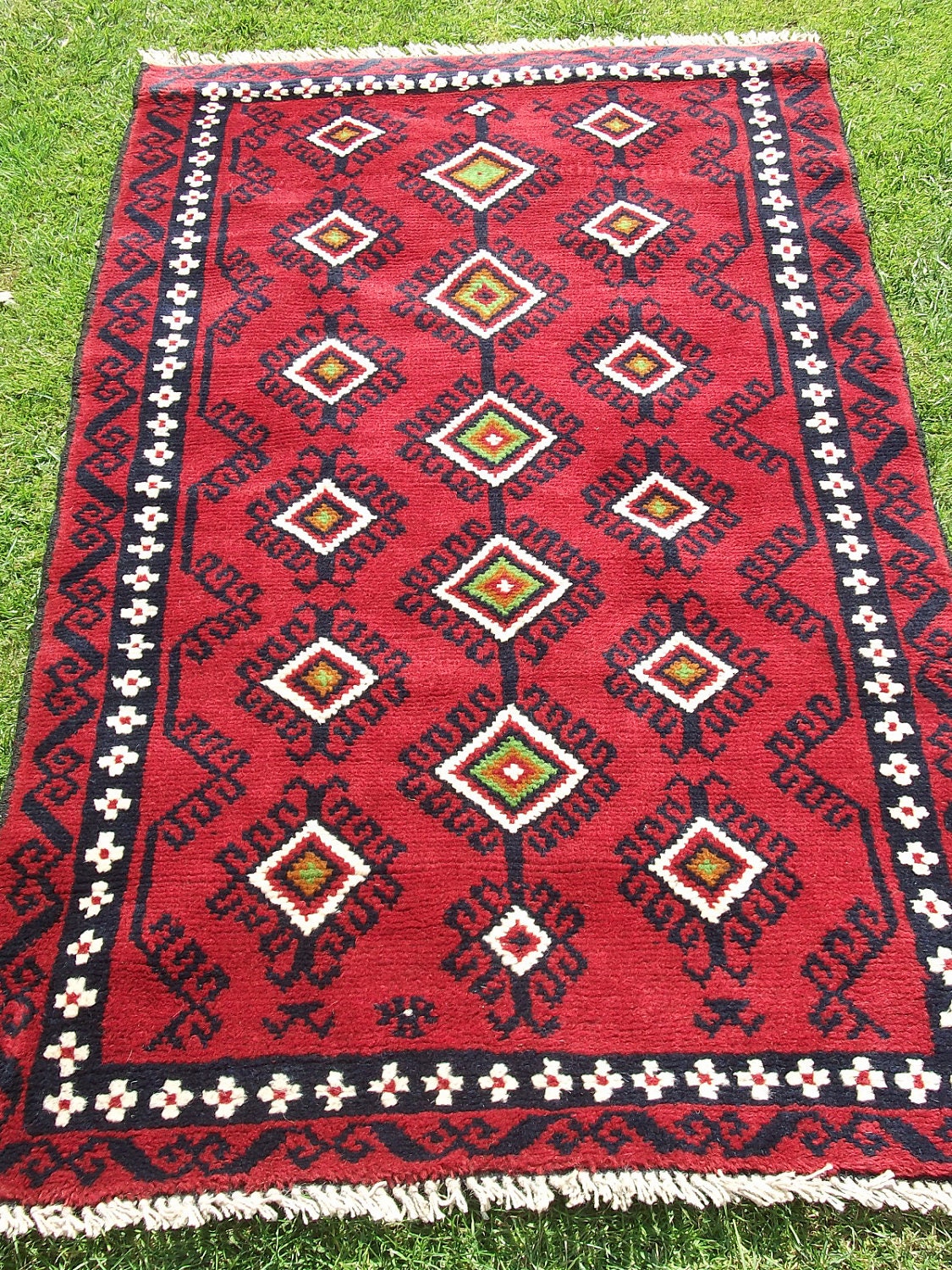 Deep Rich Red Baluchi rug/kilim from Afghanistan. Hand woven.