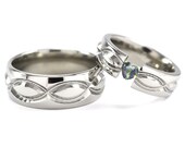 New Infinity His and Hers Tension Set Titanium Wedding Rings