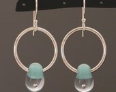 Earrings, silver circles and handmade lampwork glass beads, Water Droplet in underwater turquoise blue.