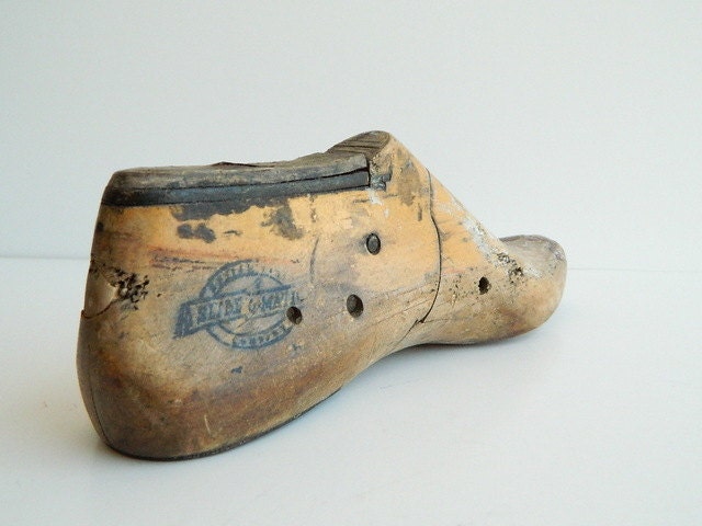 One industrial rustic wood shoe form