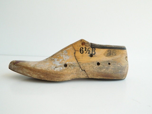 One industrial rustic wood shoe form