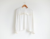 Vintage El Palacio de Hierro ivory blouse top with a big collar.
