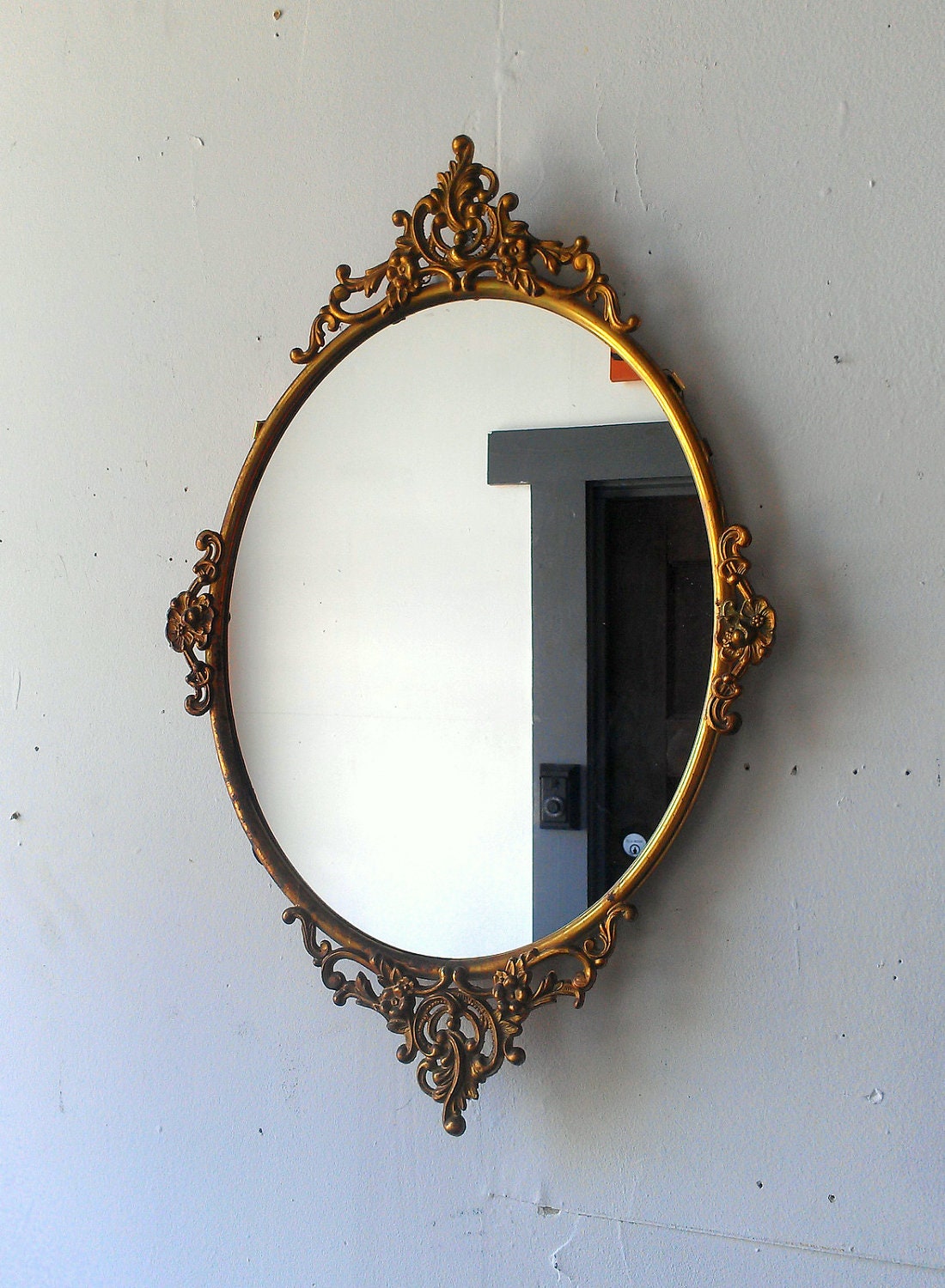 Antique Oval Mirror in Ornate Brass Frame 19 by 12 inches