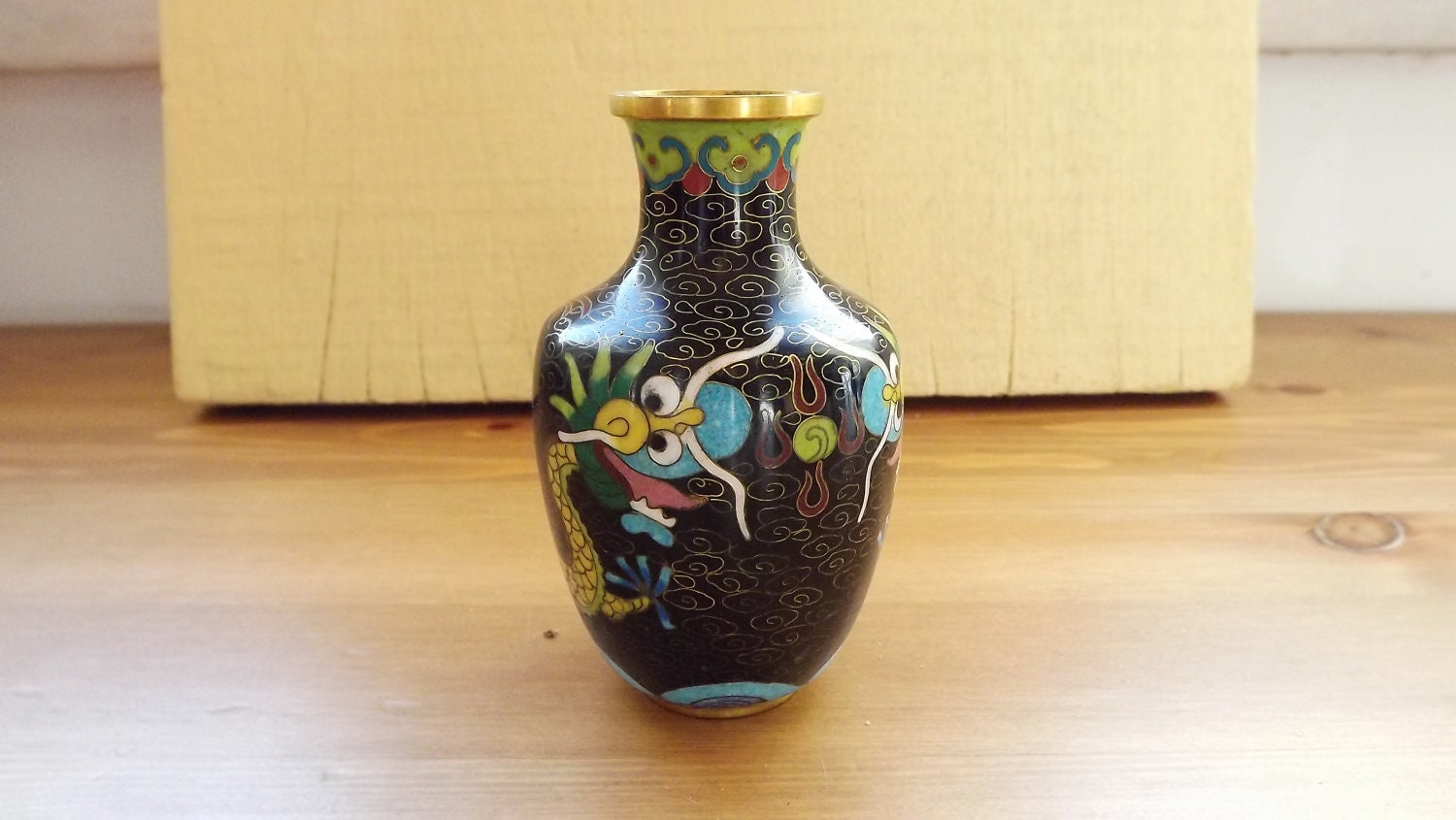 Antique cloisonne vase with a dragon