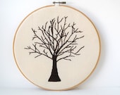 Embroidered brown tree on cream cotton wood embroidery hoop wall art