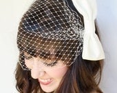 Ivory Satin Bow Clip with ivory birdcage veil
