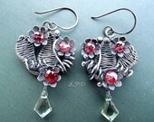Wire Wrapped Sterling Silver Dangle Earrings Handmade Leaves Mozambique Garnets Green Amethyst.
