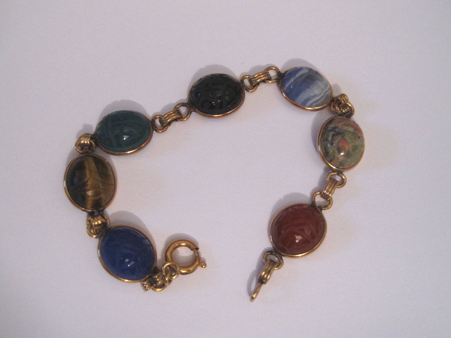 sterling silver scarob bracelet, mulit colored with vintage design, colored stones, unused