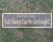 love like crazy... But always kiss me goodnight sign made from reclaimed wood