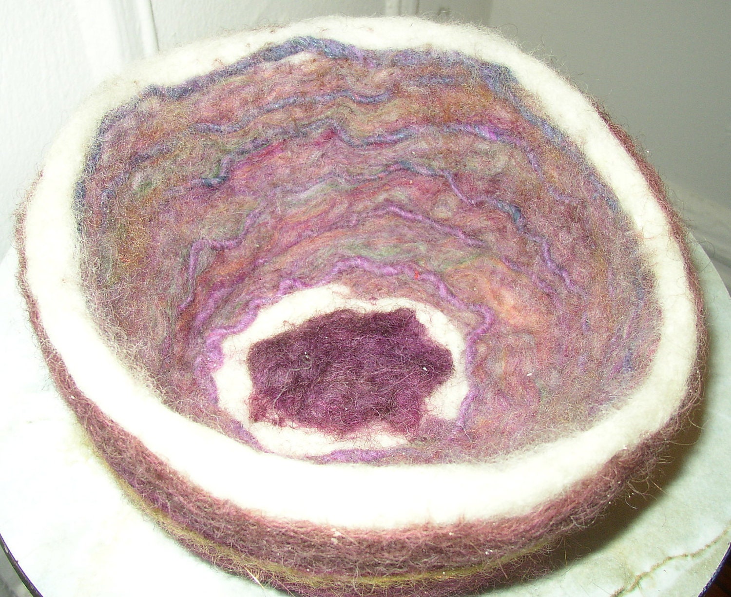 golden swirls, a burgundy needle felted wool bowl